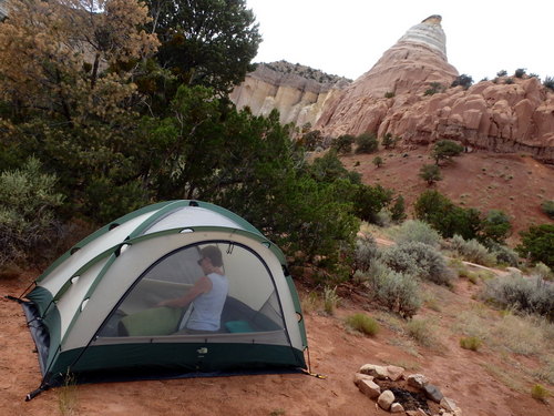 GDMBR: The tent is up and Terry is opening the self-inflating mattress.